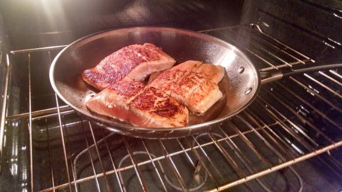 Finishing off the salmon in the oven allows for even cooking.